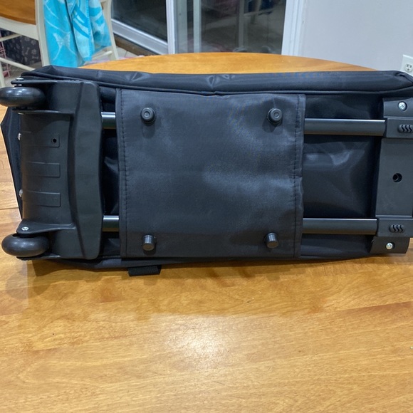 NWOT.  Nylon rolling carry-on bag. - Picture 3 of 13